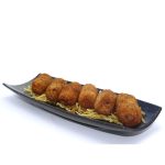 Croquetas de jamón ibérico rebozadas con sésamo tostado